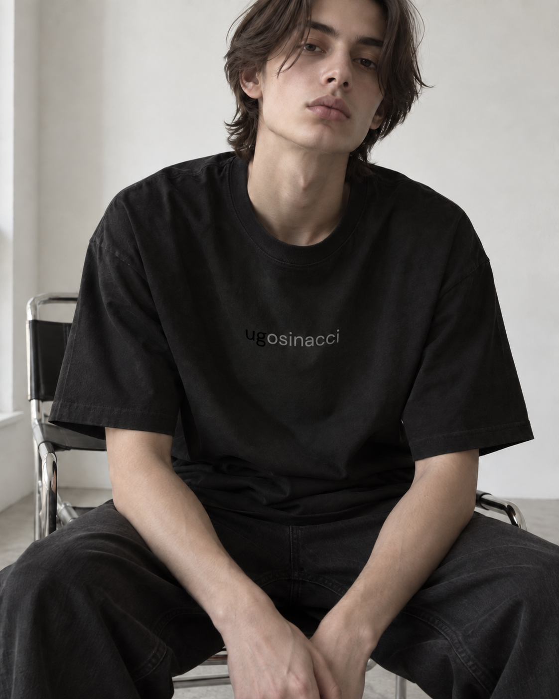Seated / black t-shirt with ugo sinacci logo